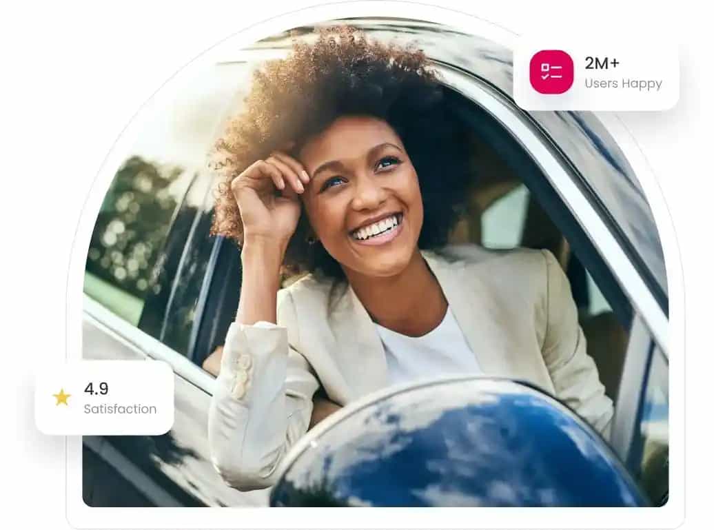 a girl smiling sitting on a car for getting affordable insurance with maximum coverage.