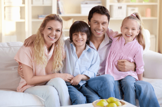 A happy family member of four persons A happy family member of four persons